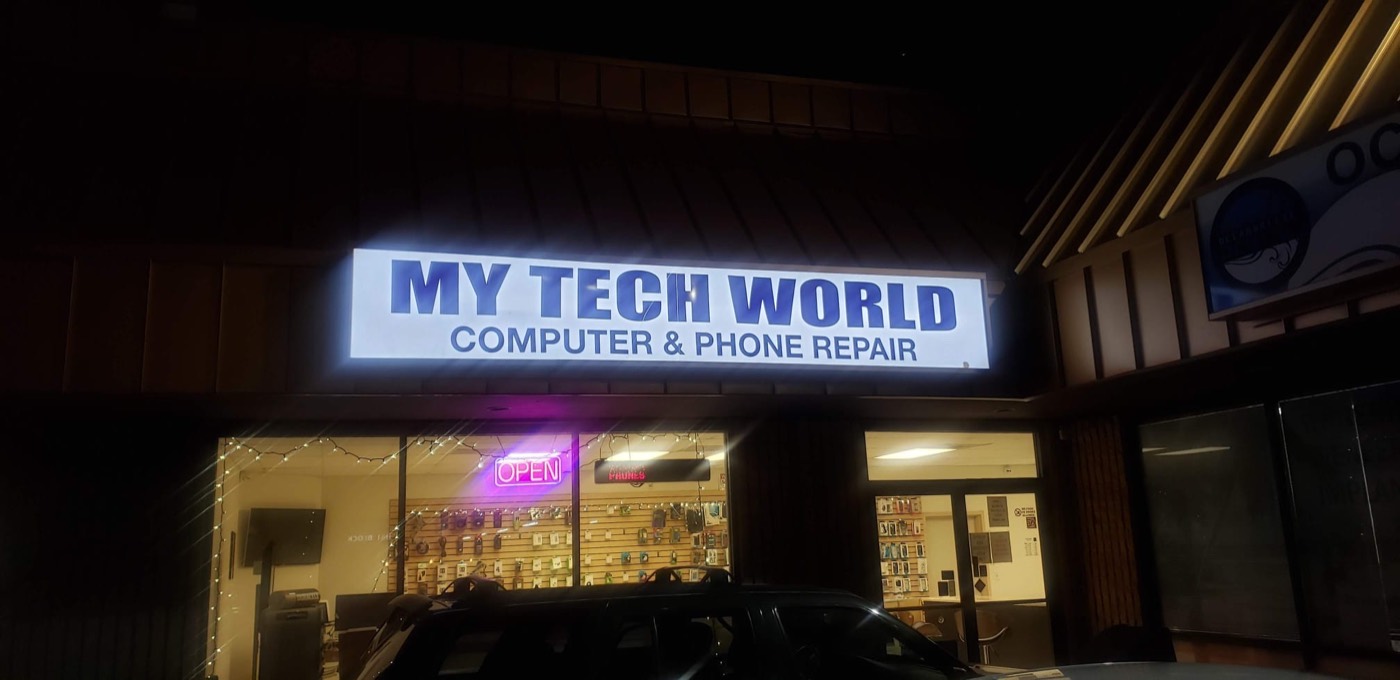 MyTechWorld storefront on Sepulveda Blvd in Culver City, lit sign at night